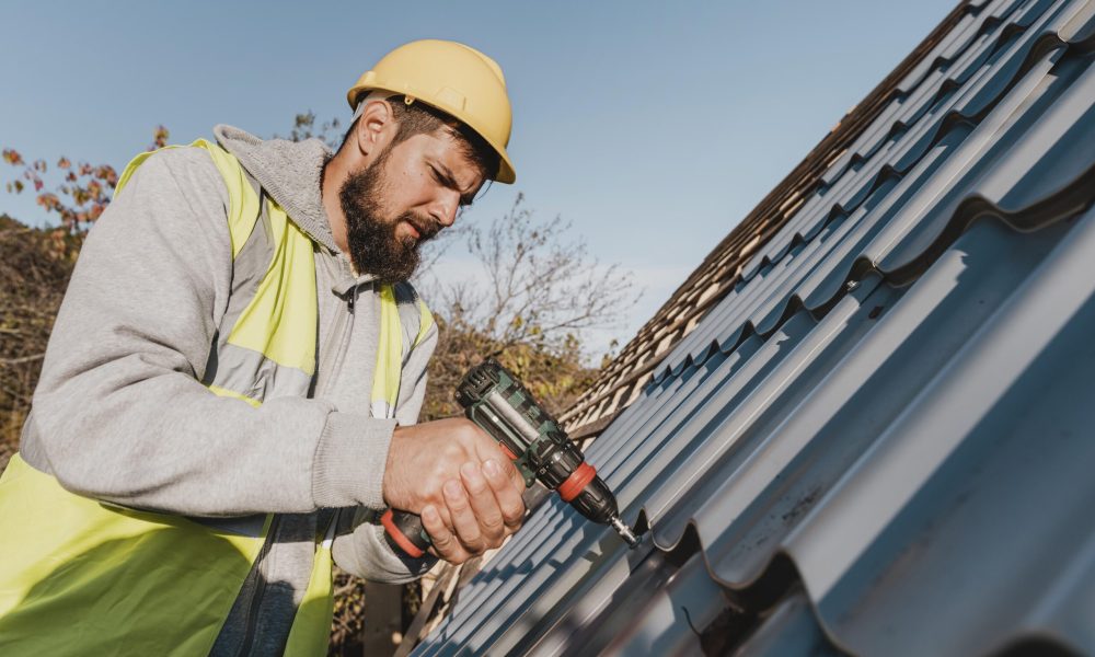 sideways-man-working-roof-with-drill